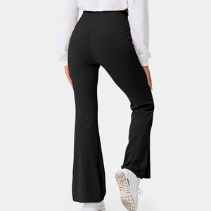 High waisted crossover split hem flare leggings by HALARA